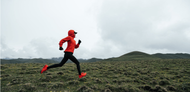 Woman running across the moors
